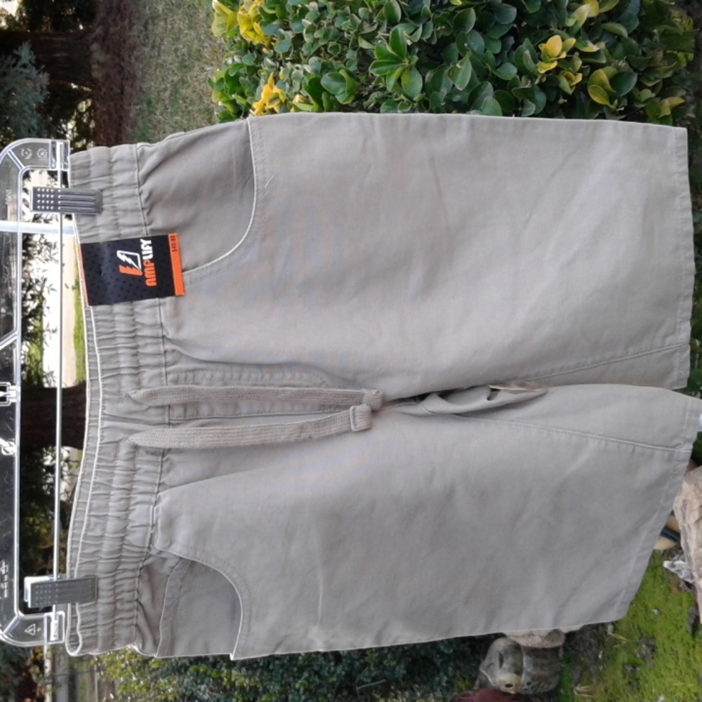 Young men's pull up shorts size small new with tags